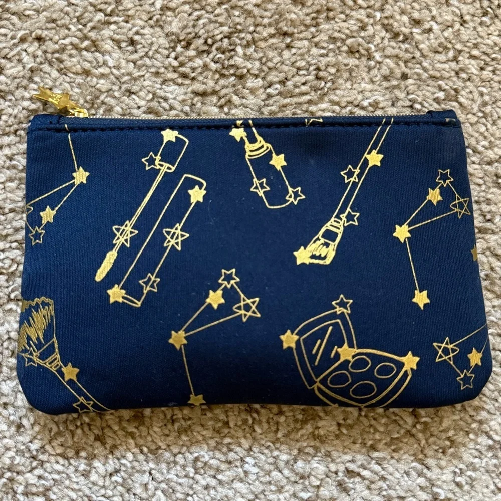 ipsy navy gold